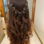 Curls with knot | Curled hairstyles for medium hair, Hairdo for long hair, Prom hairstyles for long hair
