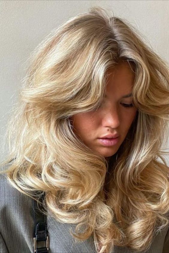Fluffy hair is the 90s blonde trend all over Instagram right now