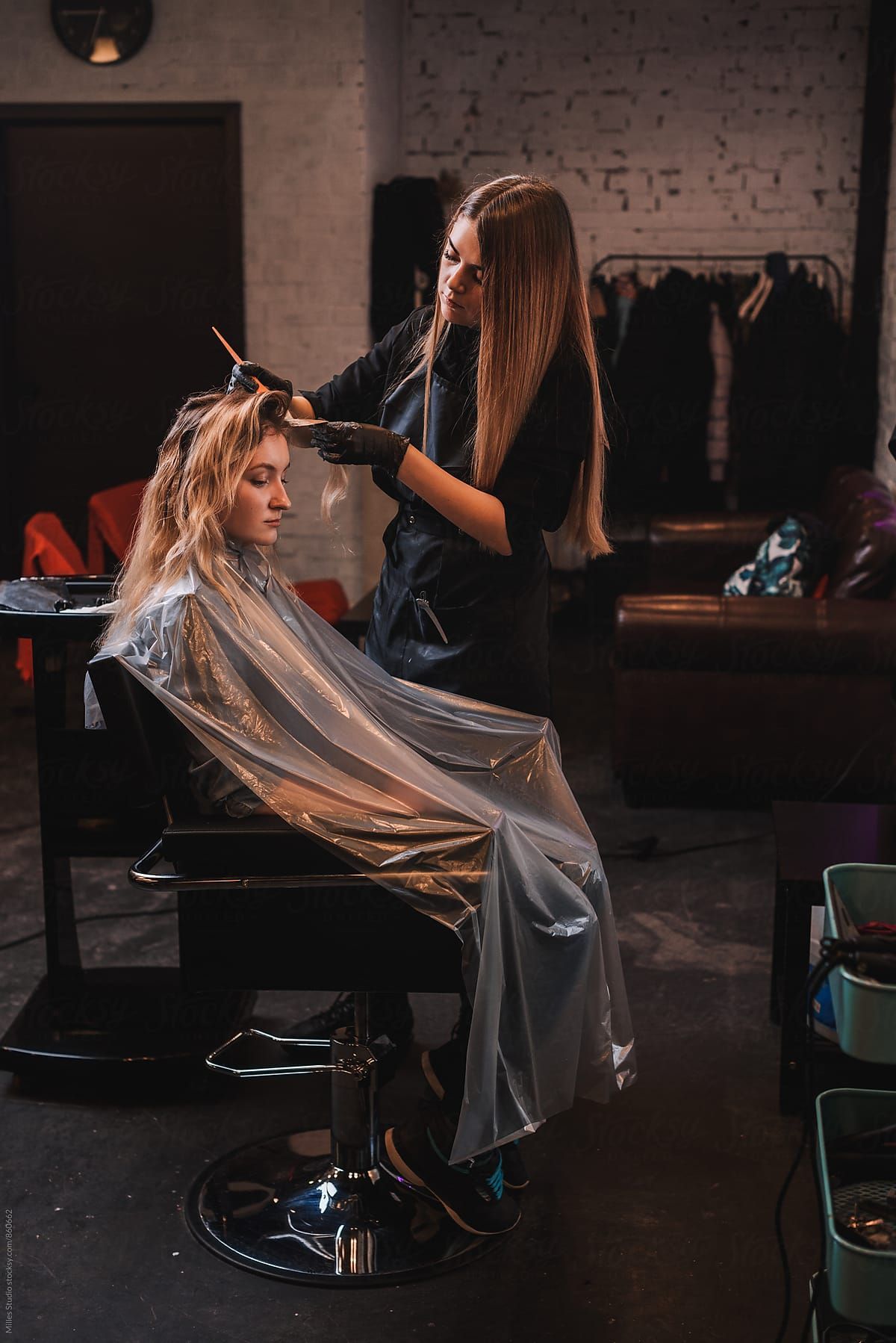 Hairdresser Dyeing Girl’s Hair” by Stocksy Contributor “Milles Studio