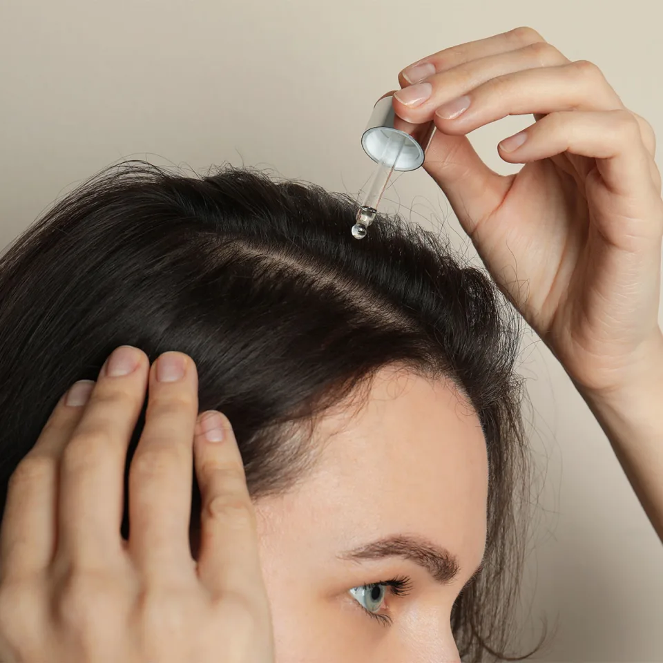 The Best Scalp Oil For Thinning Hair, According To Hair Loss Experts