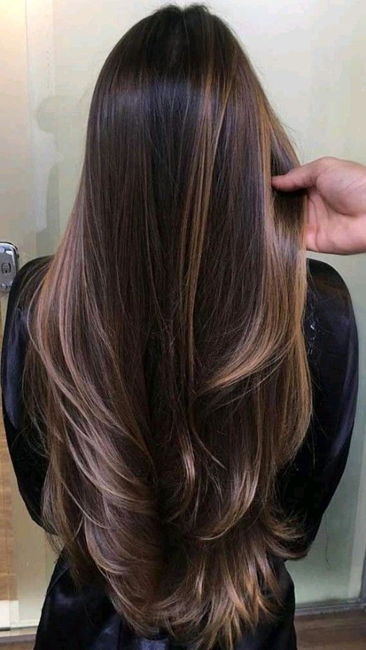 Long haircut with layers with highlights