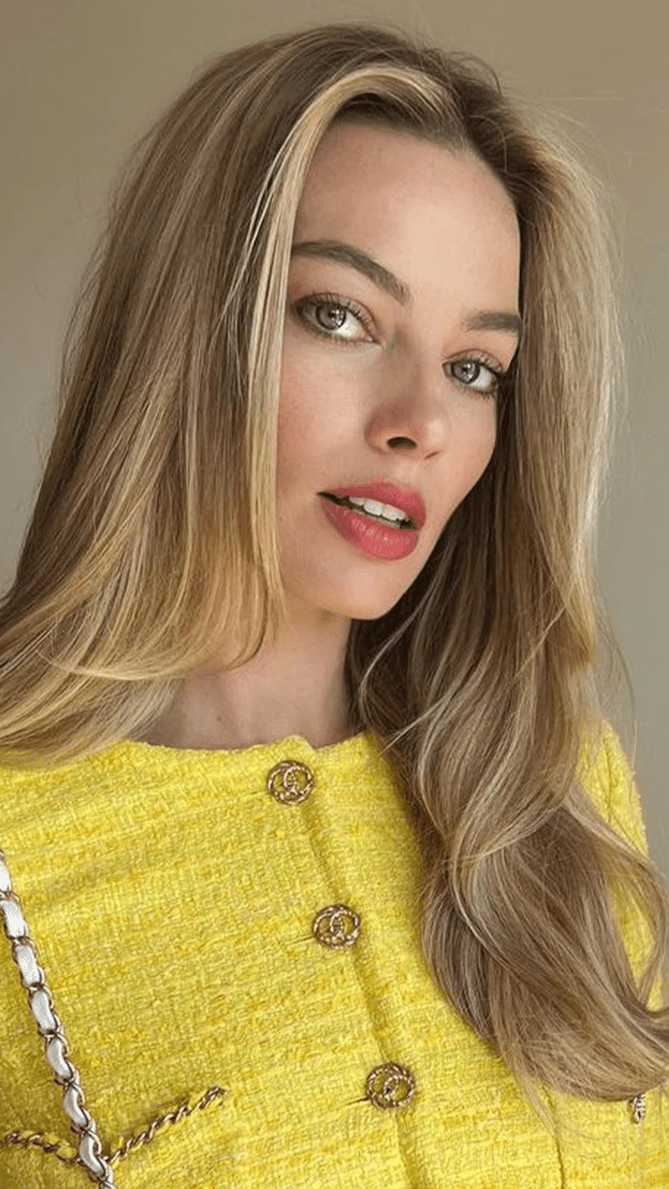 Margot Robbie Channels Retro Barbie With a Bouncy Pony and Cherry Manicure