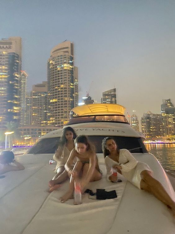 rich on a yacht